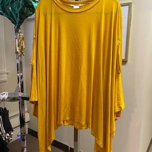 Knit Cape top with arm slit